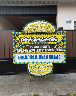 Papan Bunga Duka di Muncan